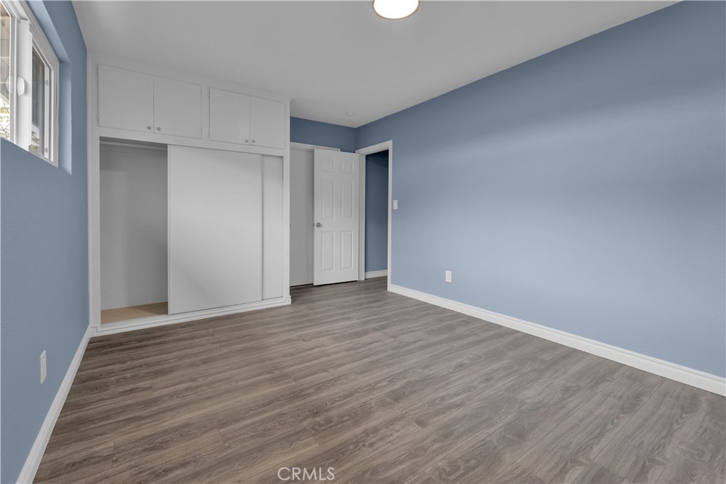 34945 Ave B Yucaipa, CA 92399 - Photo 52 of 69 a view of an empty room with wooden floor
