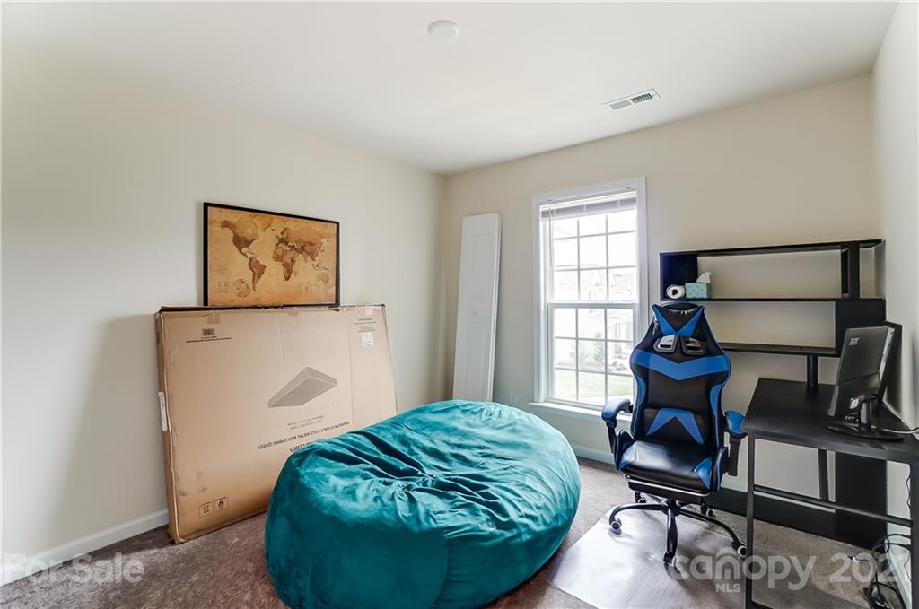 929 Wicawa Road Fort Mill, SC 29708 - Photo 22 of 28 a living room with furniture