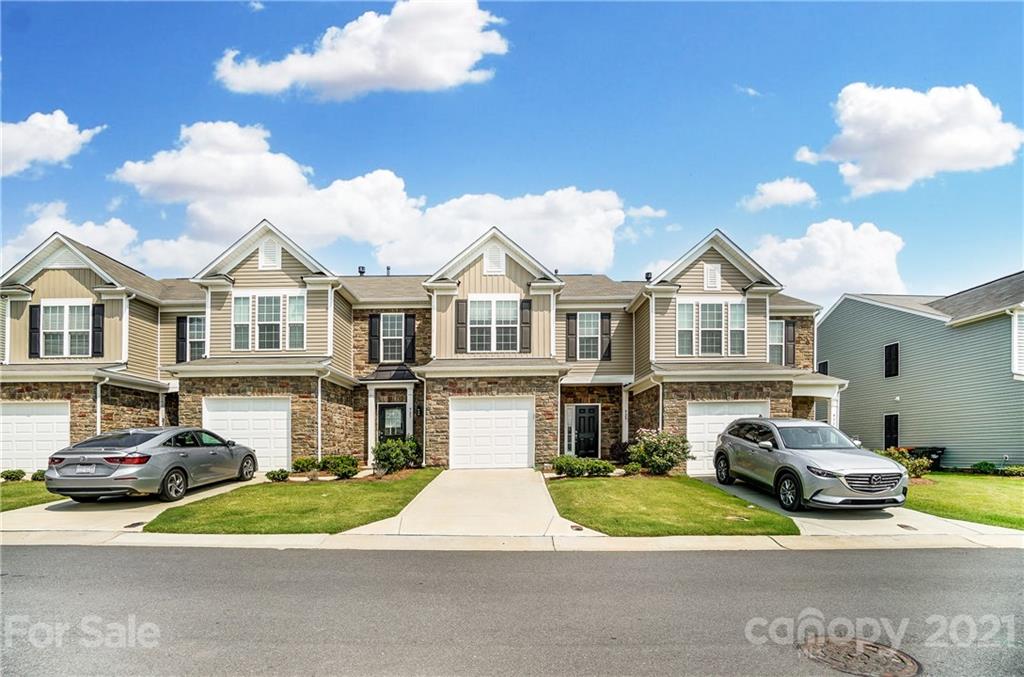 929 Wicawa Road Fort Mill, SC 29708 - Photo 4 of 28 a view of multiple houses with a street
