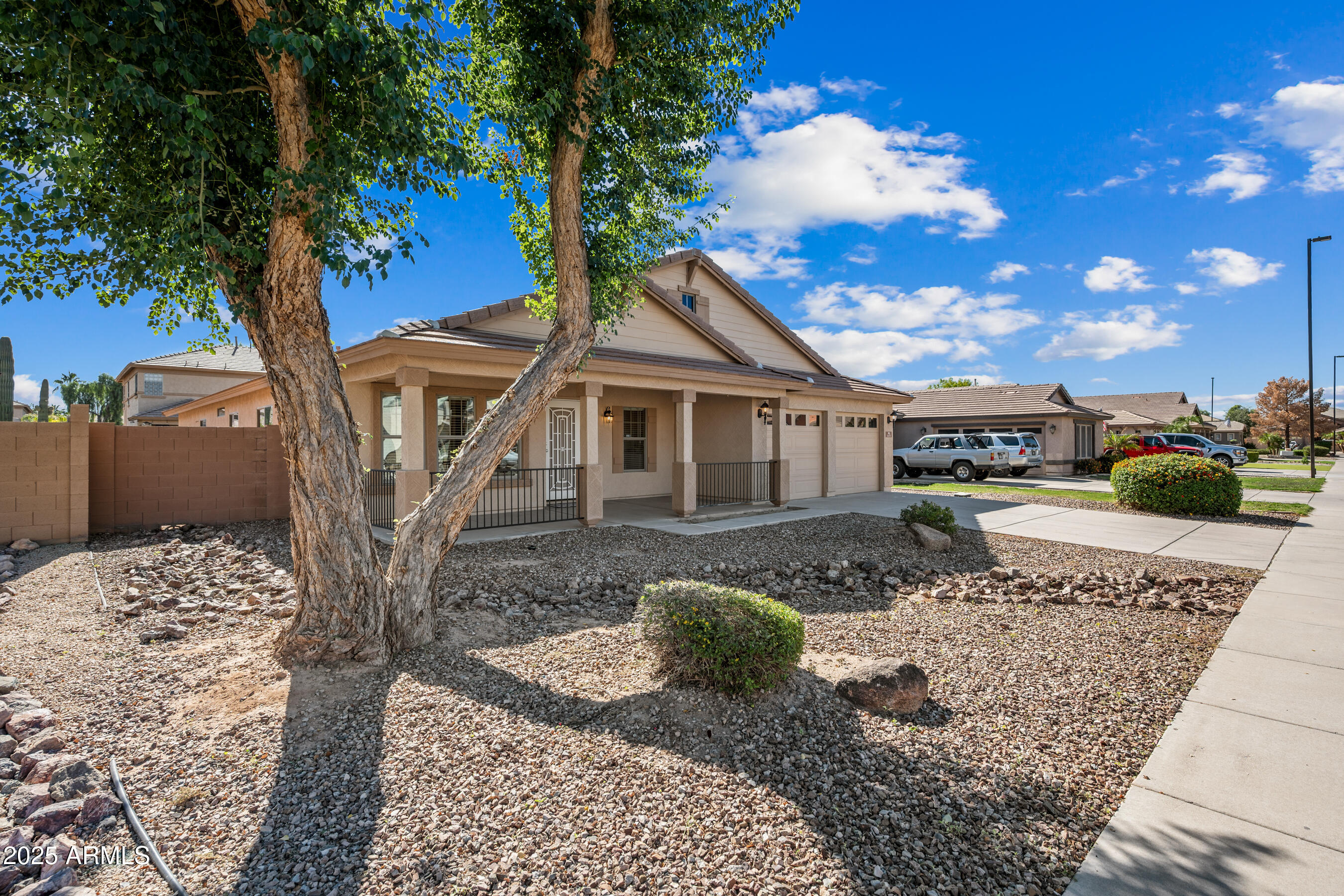 3471 East Fairview Street Gilbert, AZ 85295 - Photo 2 of 48 a front view of a house with a yard
