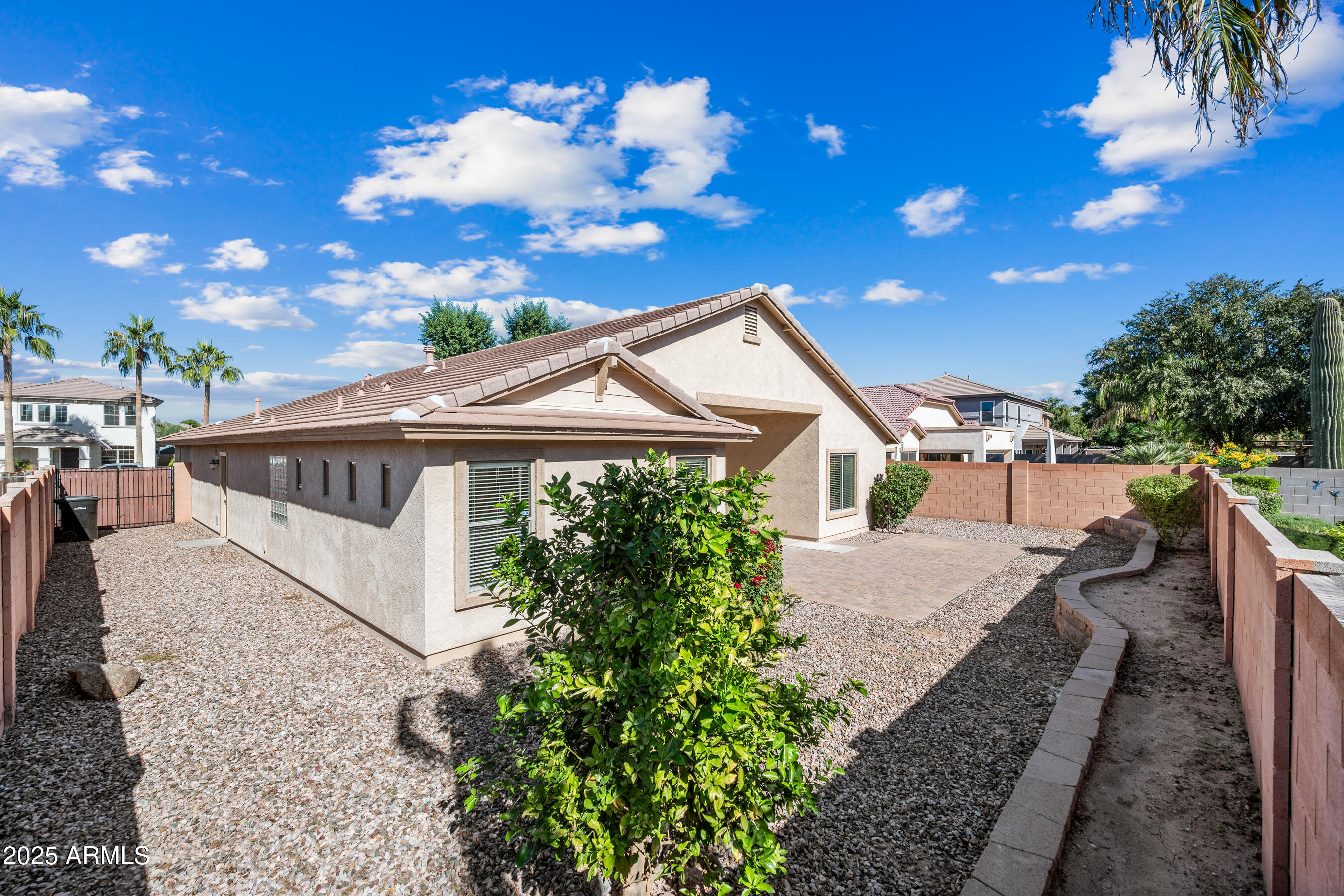 3471 East Fairview Street Gilbert, AZ 85295 - Photo 27 of 48 a view of a house with a yard