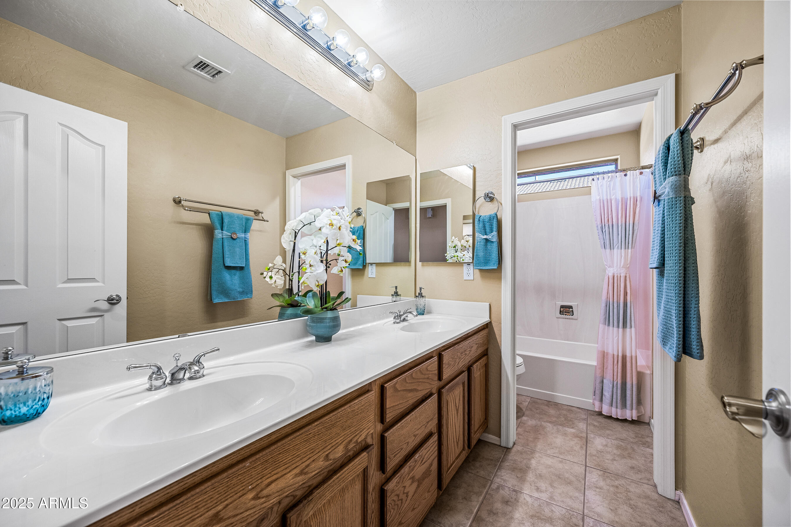 3471 East Fairview Street Gilbert, AZ 85295 - Photo 38 of 48 a spacious bathroom with a double vanity sink mirror and double
