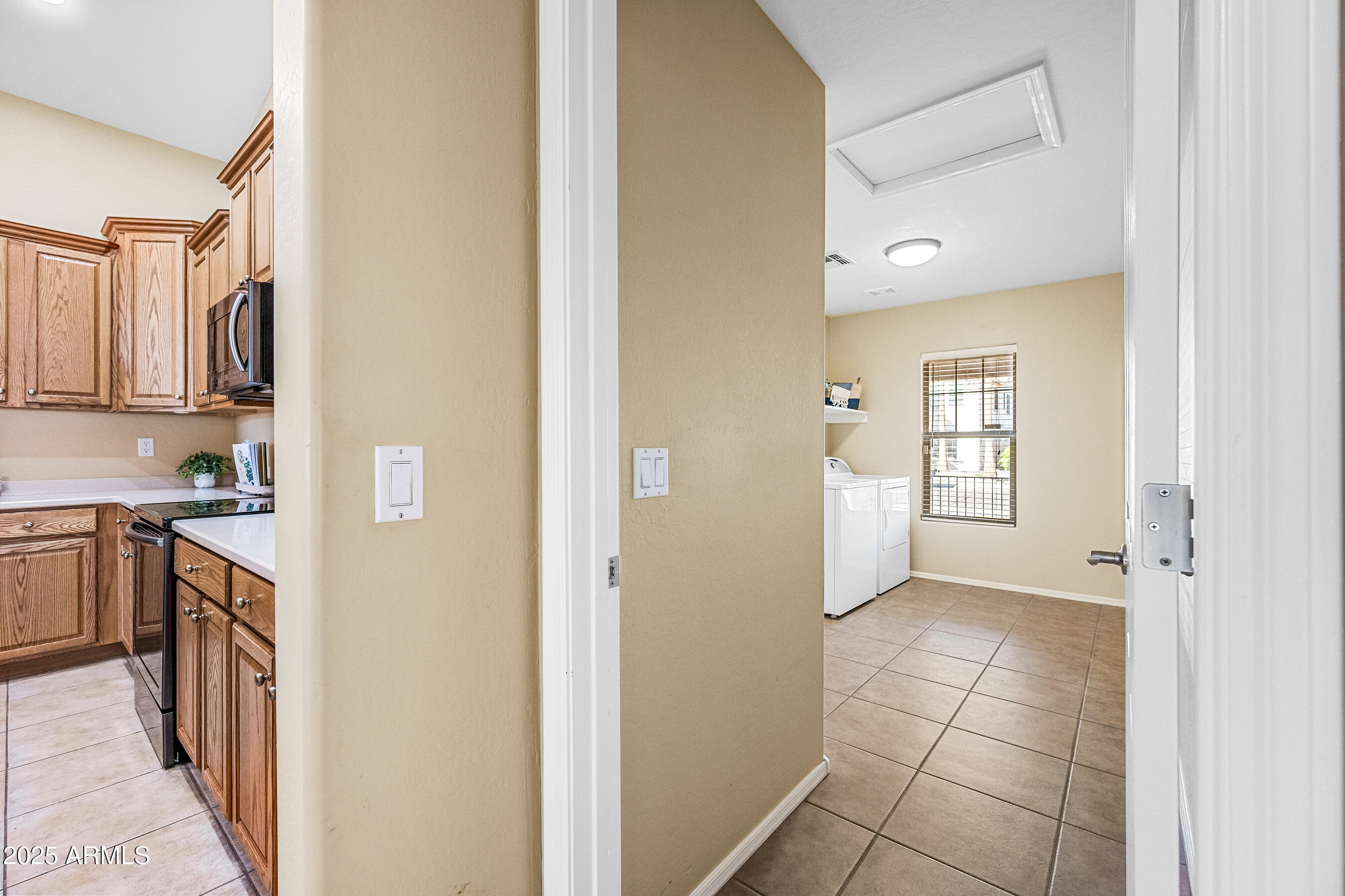 3471 East Fairview Street Gilbert, AZ 85295 - Photo 41 of 48 a view of a kitchen with a sink and dishwasher stove top oven with wooden floor