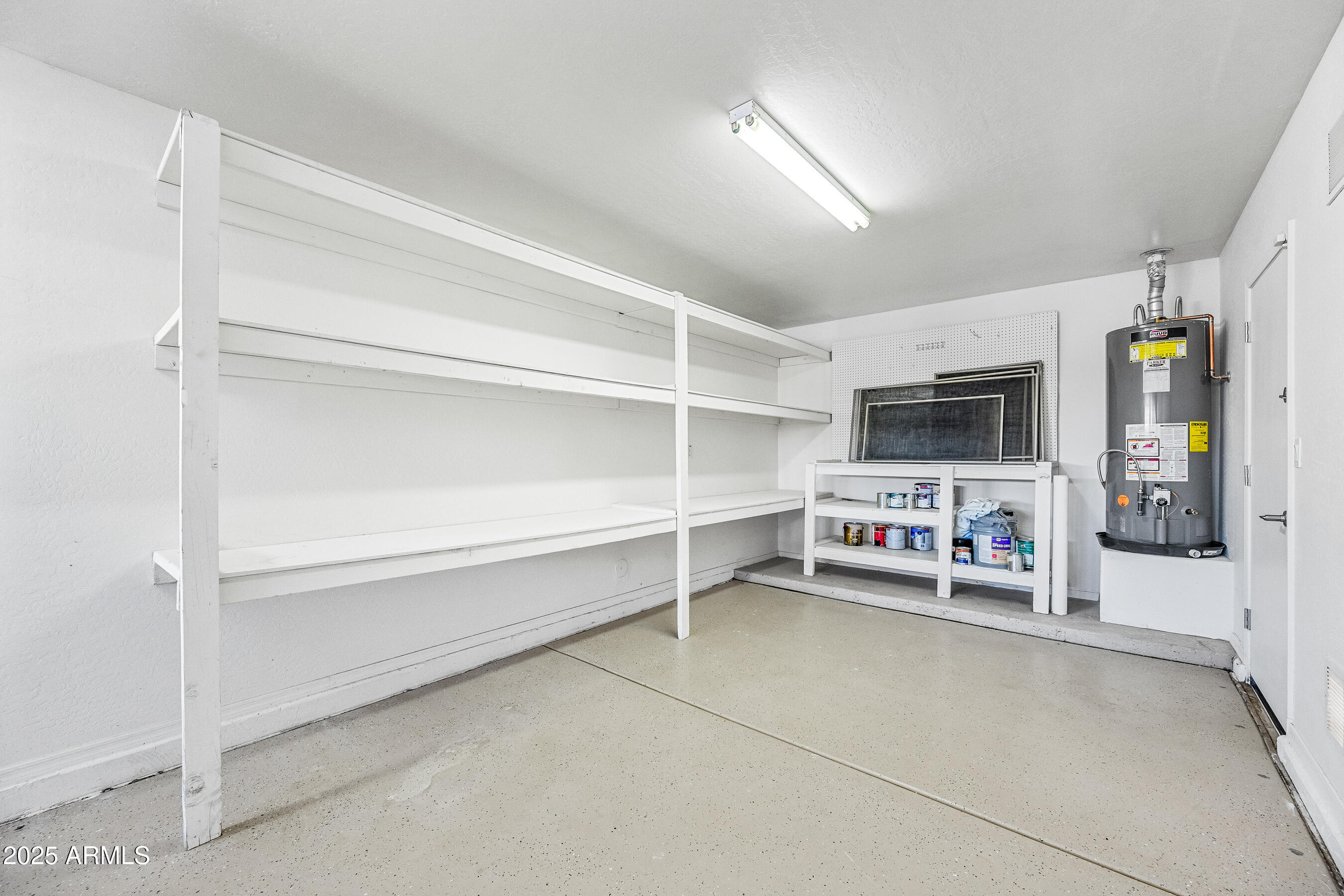 3471 East Fairview Street Gilbert, AZ 85295 - Photo 45 of 48 a view of a livingroom with shelves