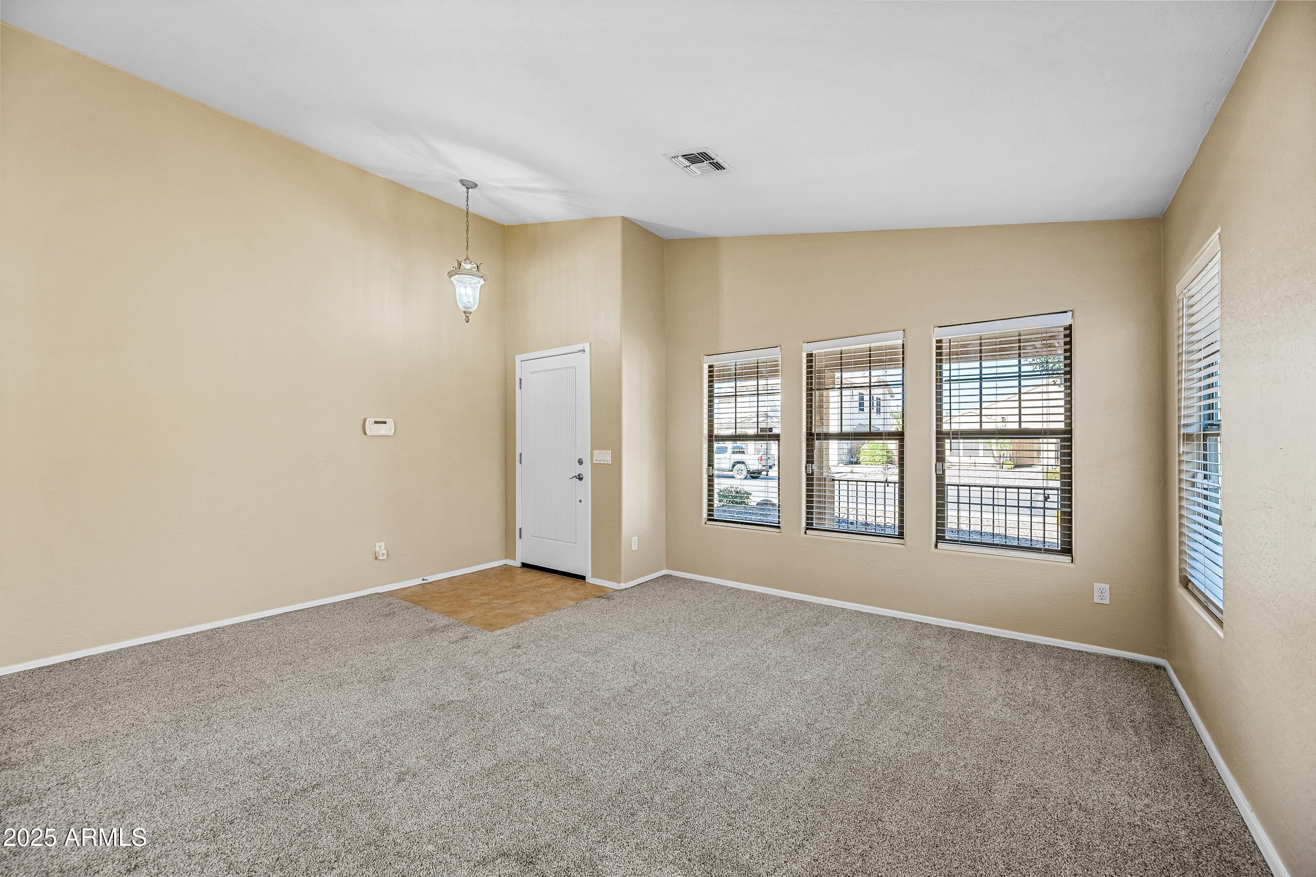 3471 East Fairview Street Gilbert, AZ 85295 - Photo 7 of 48 a view of an empty room with a window