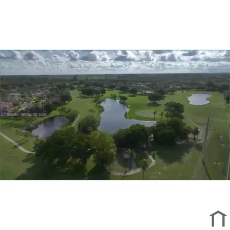 a view of a city with an ocean