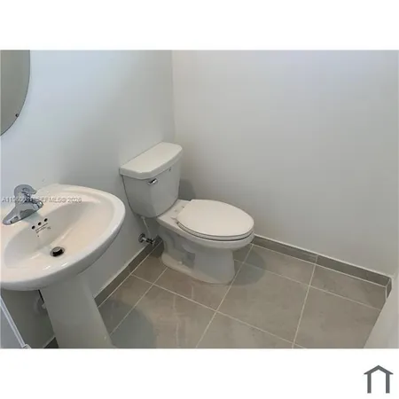 a black and white photo of a living room