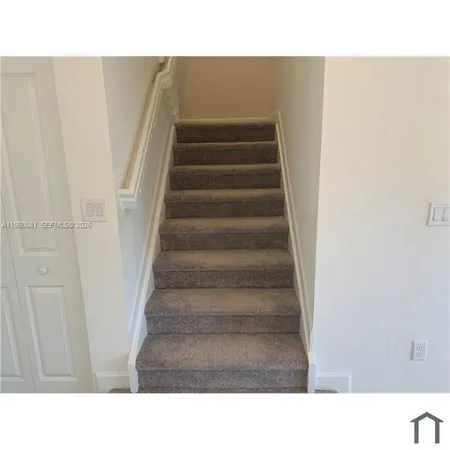 a black and white photo of a room