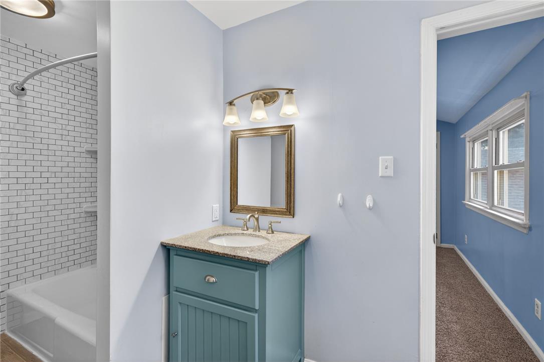 1371 Stoke Park Road Bethlehem, PA 18017 - Photo 41 of 55 a bathroom with a sink and a mirror