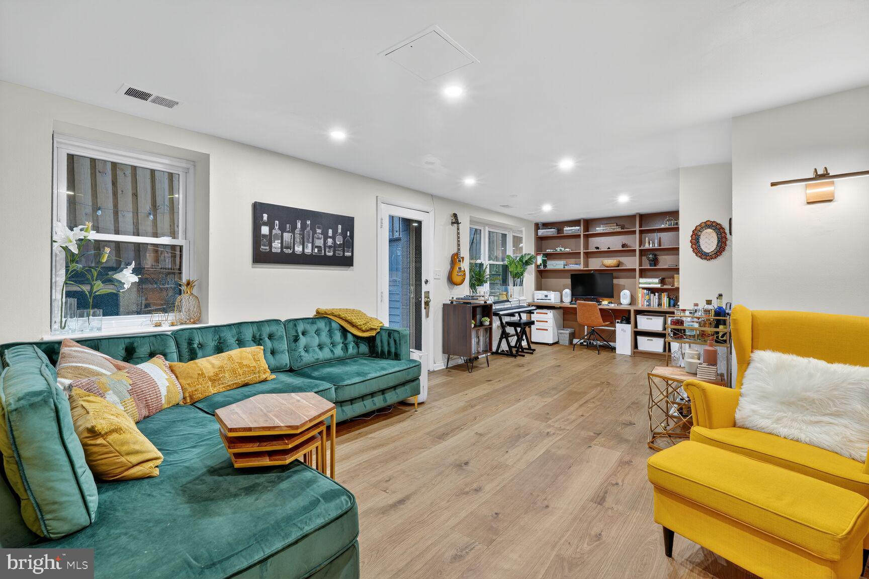2012 O Street Northwest, Unit 12 Washington, DC 20036 - Photo 3 of 16 a living room with furniture and a table