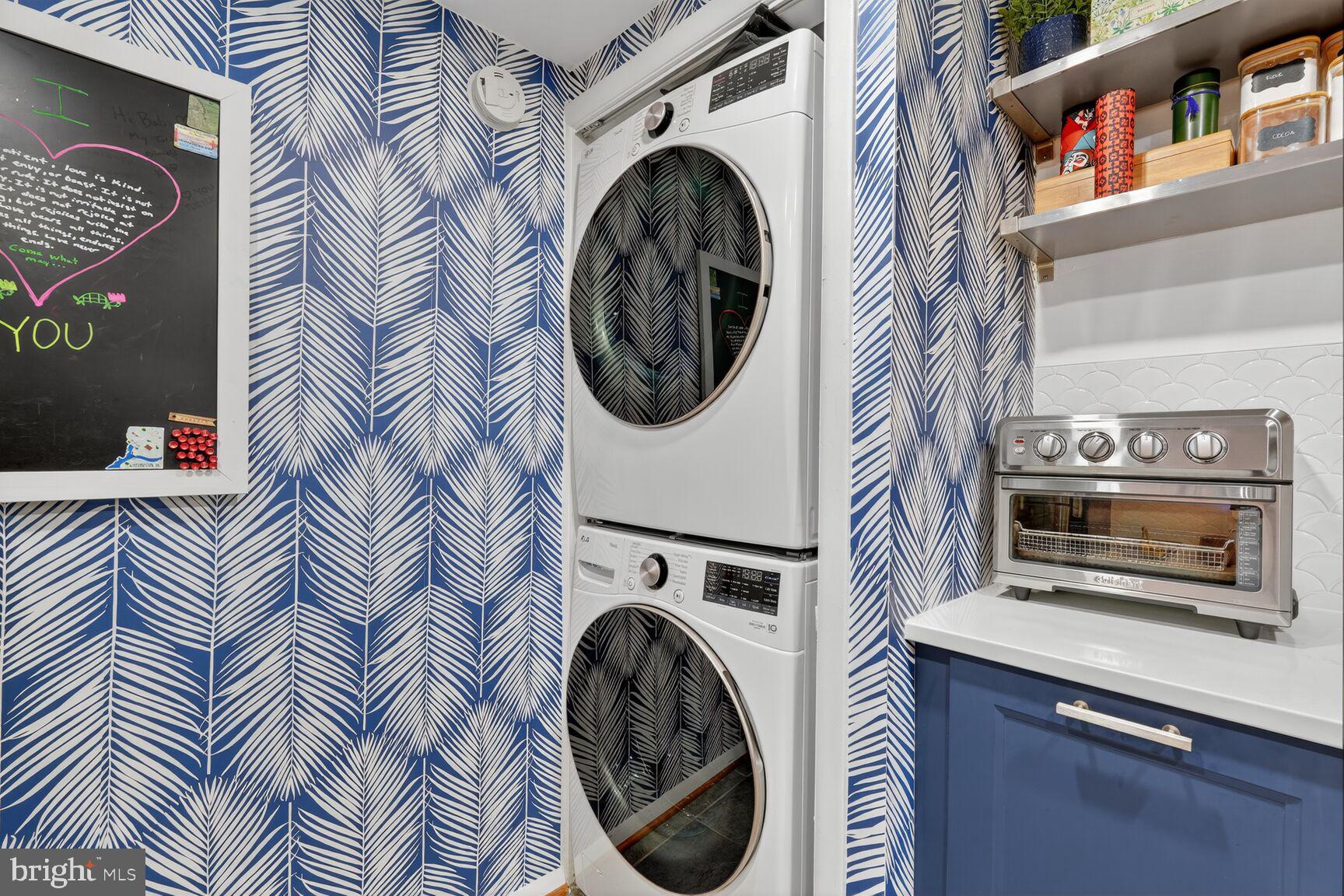 2012 O Street Northwest, Unit 12 Washington, DC 20036 - Photo 10 of 16 a utility room with dryer and washer