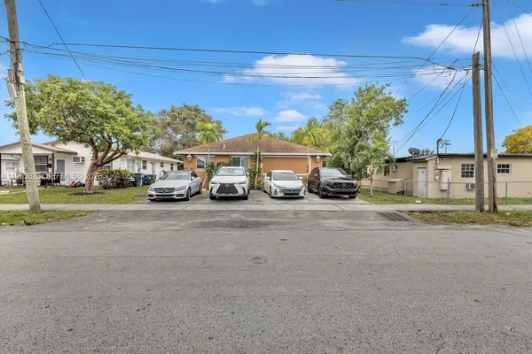 a car parked in front of a house