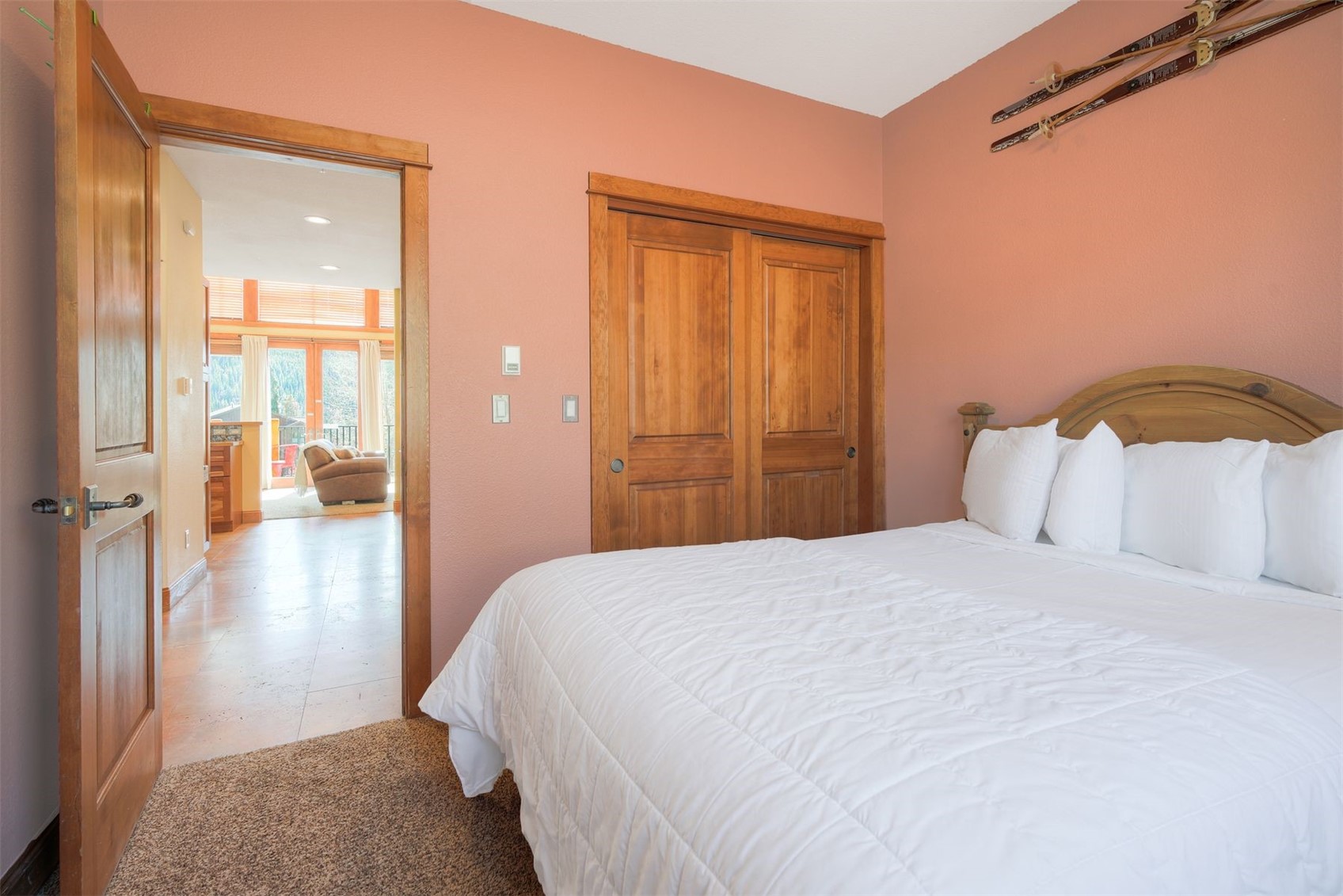 71 Antlers Gulch Road, Unit 303 Keystone, CO 80435 - Photo 18 of 35 a bedroom with a bed and a mirror