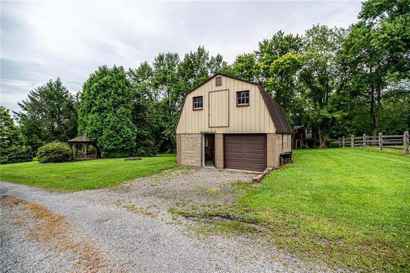 119 Fraser Road Valencia, PA 16059 - Photo 22 of 25 Awesome barn features a woodshop, large garage and massive storage upstairs!