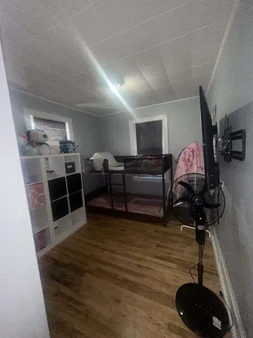 a view of a livingroom with furniture and furniture