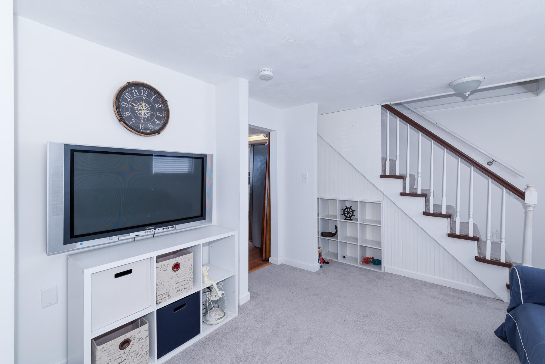 18 Great River Road Mashpee, MA 02649 - Photo 14 of 31 a living room with flat screen tv and a ceiling fan