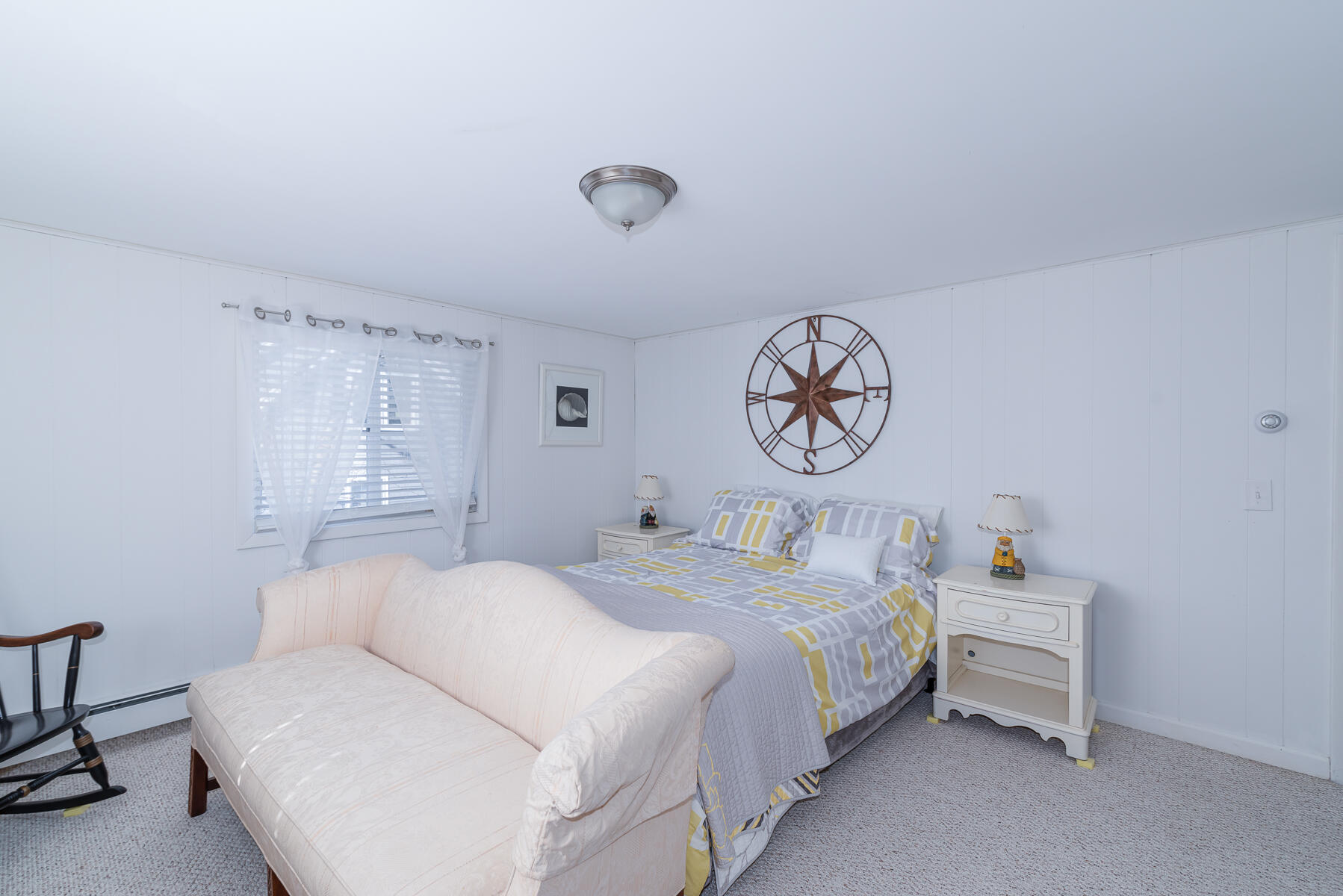 18 Great River Road Mashpee, MA 02649 - Photo 15 of 31 a bedroom with a bed and a table in it