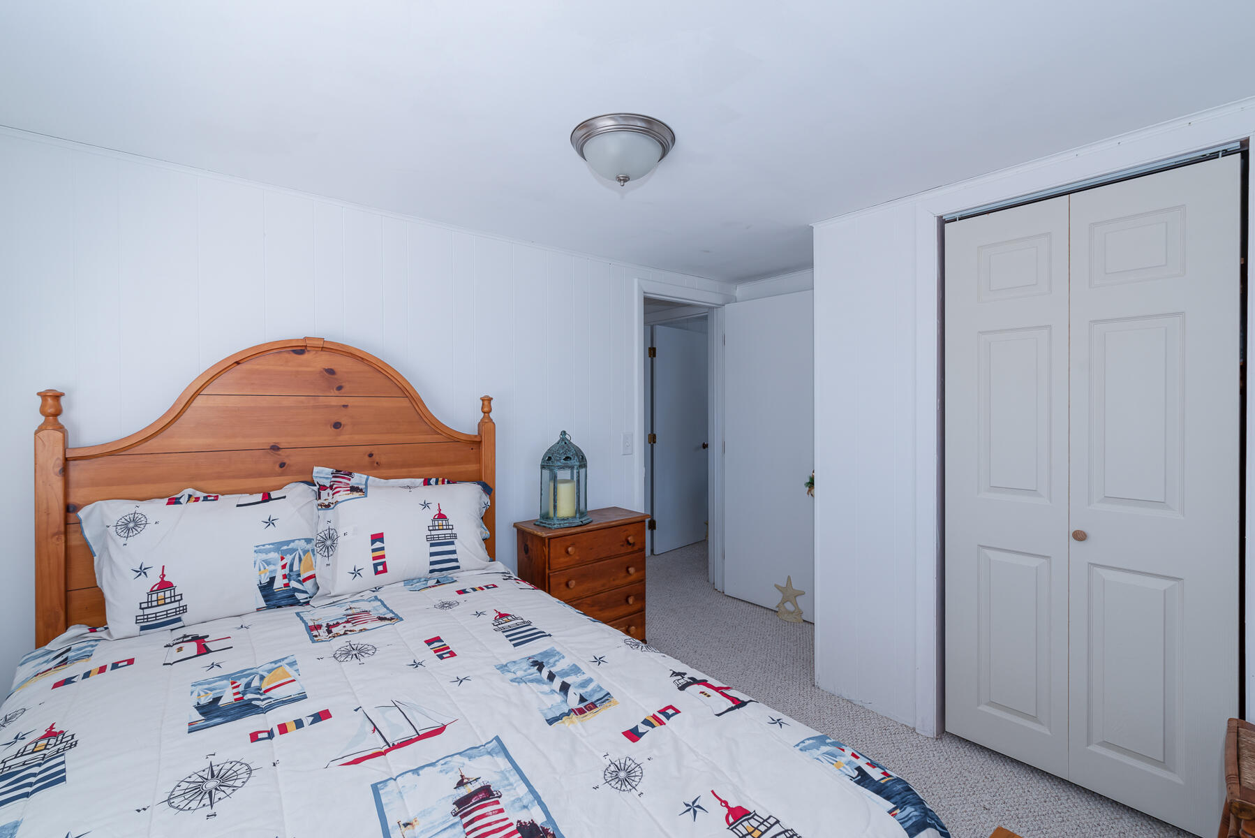 18 Great River Road Mashpee, MA 02649 - Photo 19 of 31 a bed in a bedroom next to a window