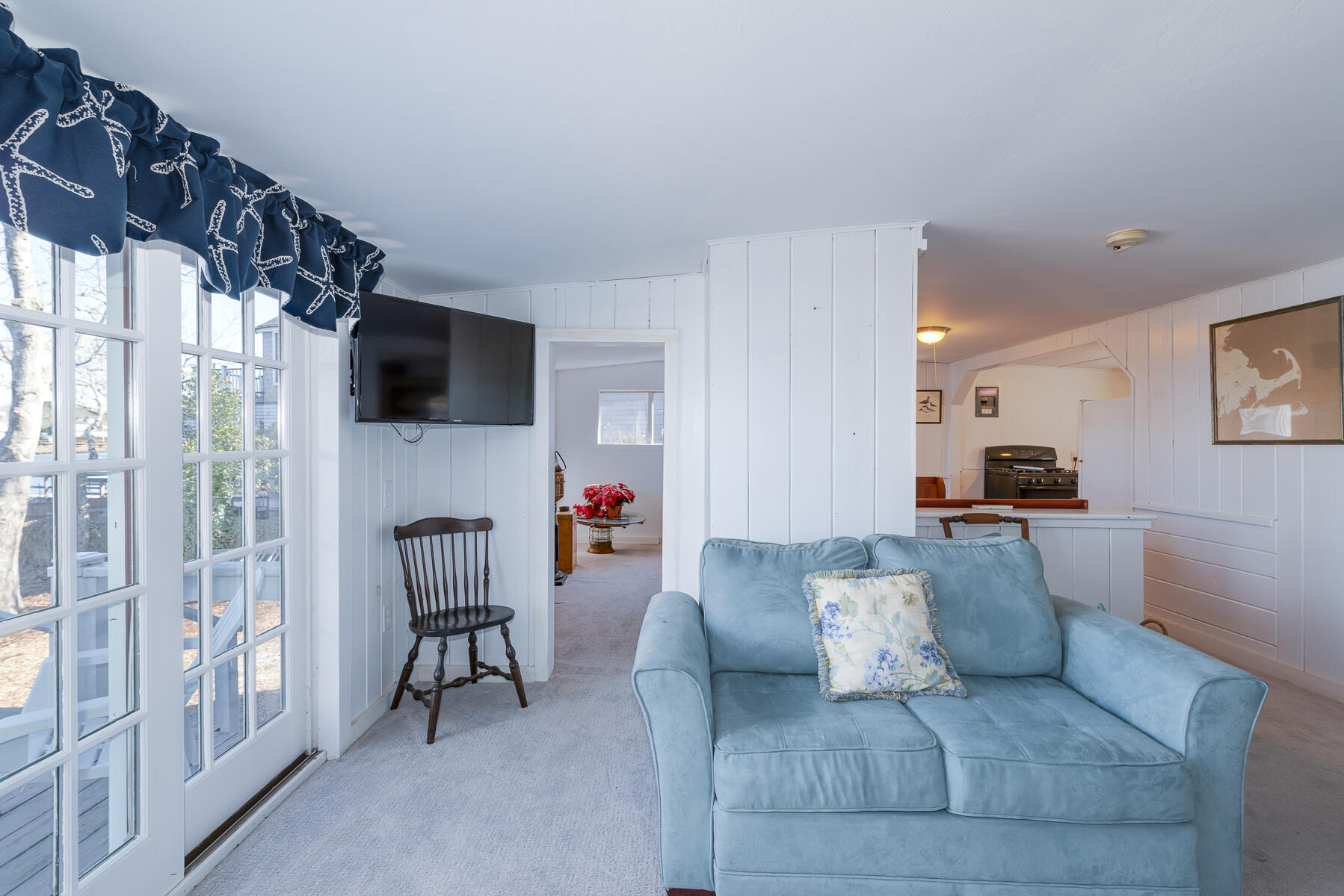 18 Great River Road Mashpee, MA 02649 - Photo 20 of 31 a living room with furniture and a flat screen tv