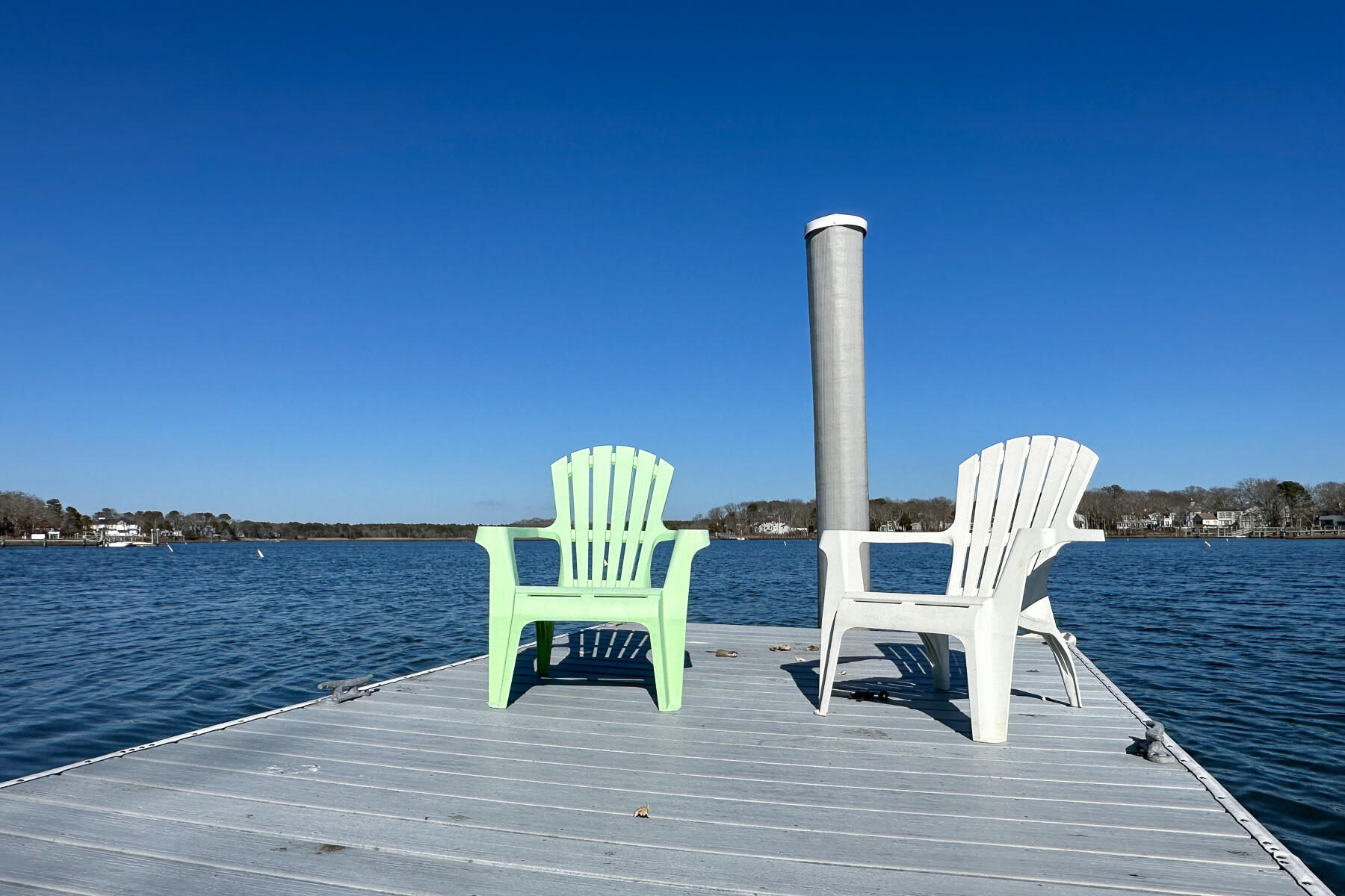18 Great River Road Mashpee, MA 02649 - Photo 3 of 31 a deck with a table and chairs