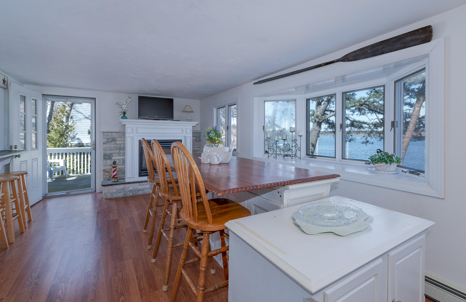 18 Great River Road Mashpee, MA 02649 - Photo 6 of 31 a view of a dining room with furniture window and wooden floor