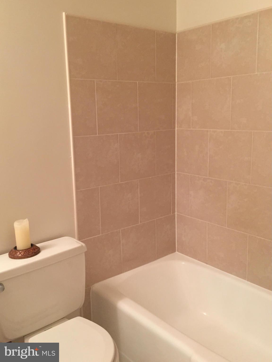 1428 Northgate Square, Unit 1A Reston, VA 20190 - Photo 11 of 20 Fresh tile and grout