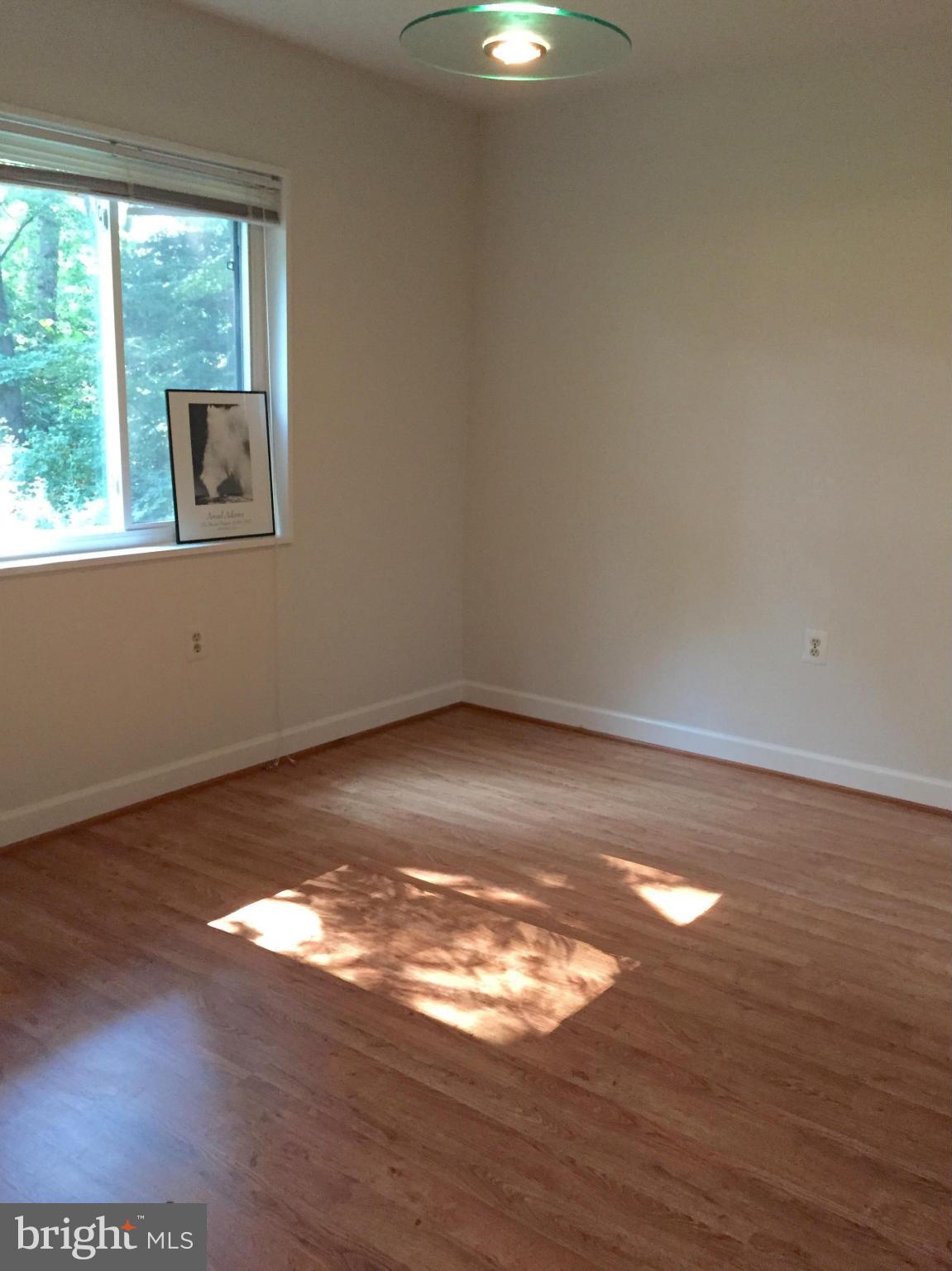 1428 Northgate Square, Unit 1A Reston, VA 20190 - Photo 7 of 20 Separate Dining Room, with view of trees