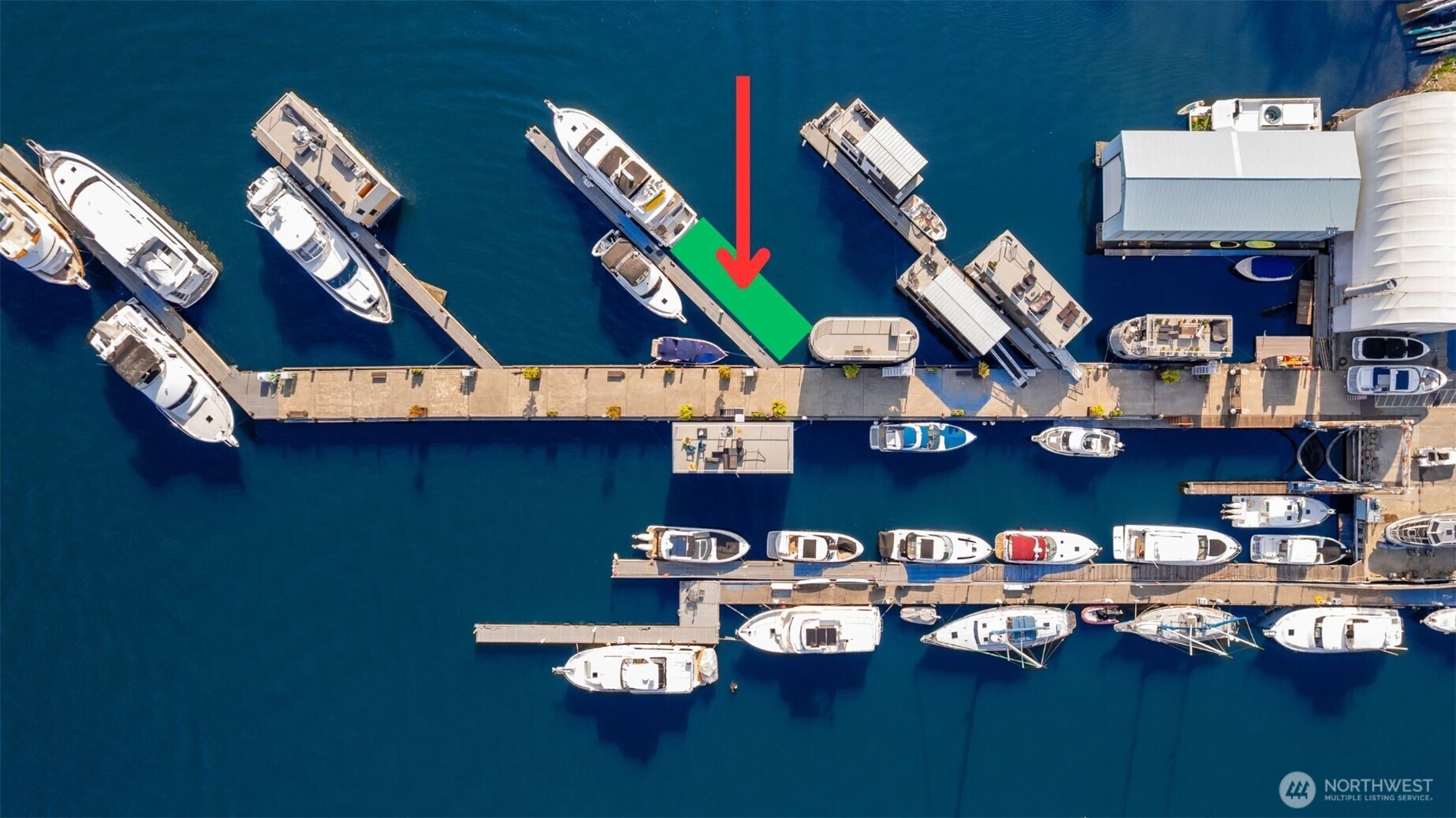 2309 North Northlake Way, Unit 7 Seattle, WA 98103 - Photo 2 of 8 a view of a dining room with furniture and wooden floor
