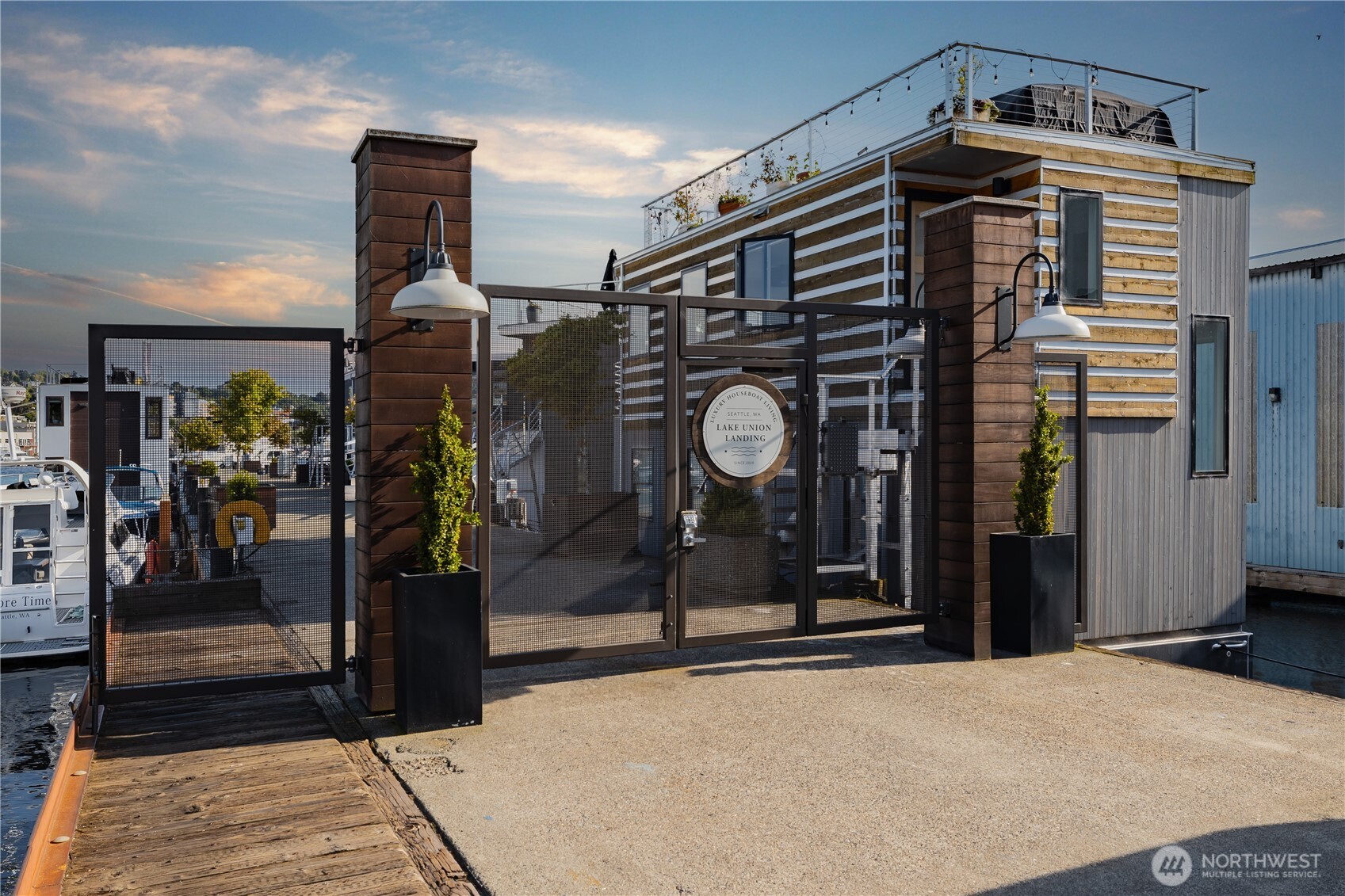 2309 North Northlake Way, Unit 7 Seattle, WA 98103 - Photo 3 of 8 a view of a building with door and wooden floor