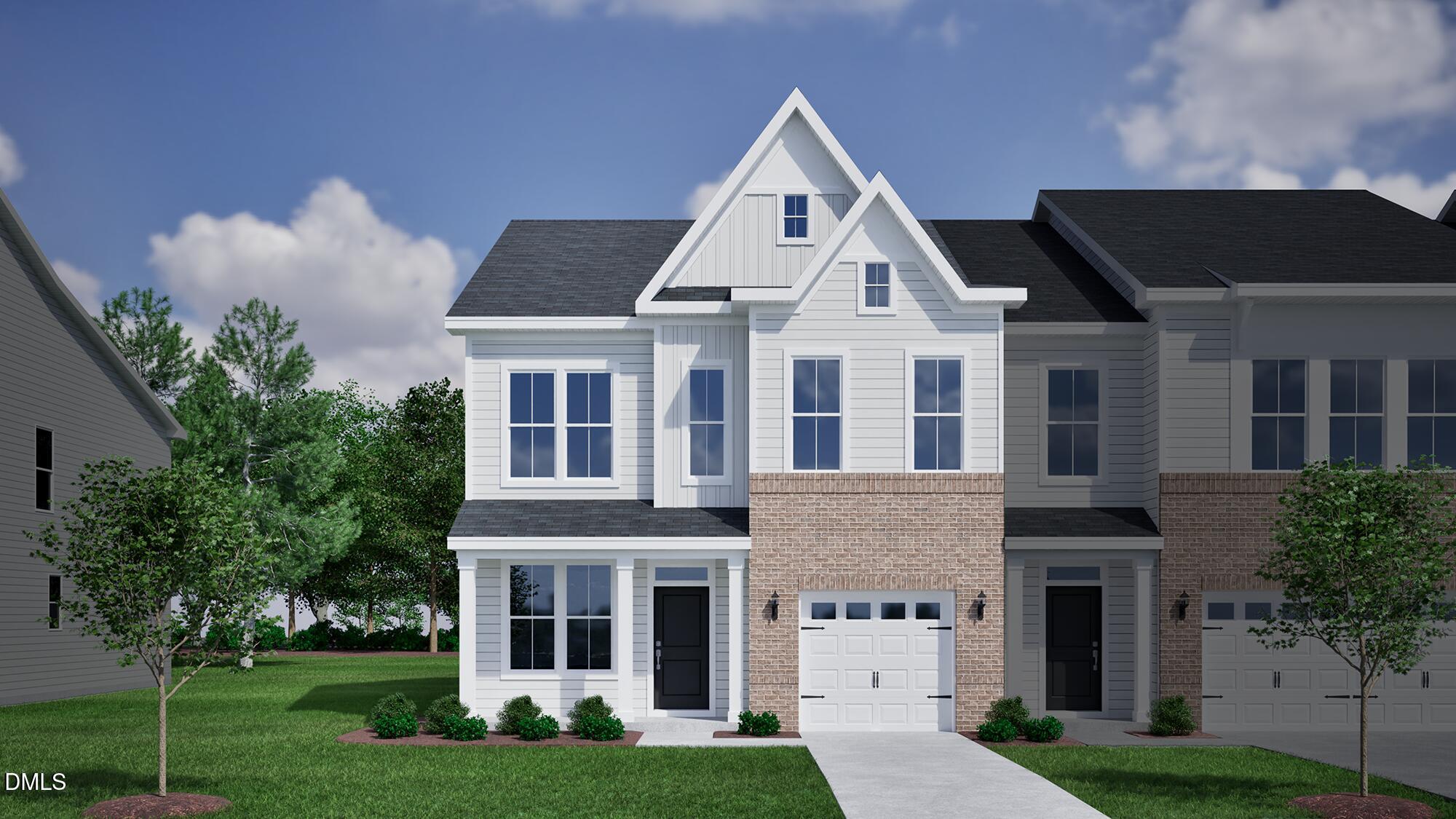 1209 Bell Heather Road, Unit 20 Durham, NC 27703 - Photo 1 of 23 a view of a white house next to a yard