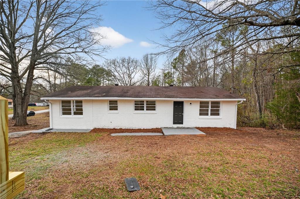 front view of house with a yard