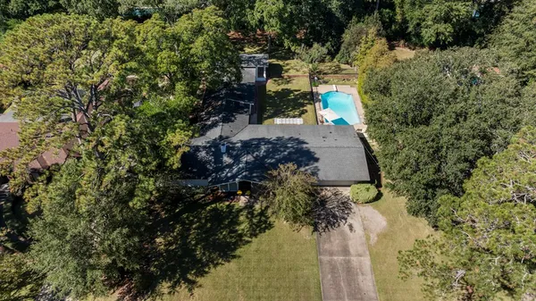 an aerial view of residential house with outdoor space