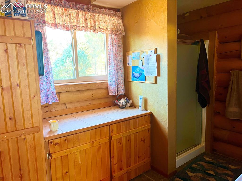 280 Kerrs Hill Road Westcliffe, CO 81252 - Photo 14 of 35 a bathroom with a sink and a mirror