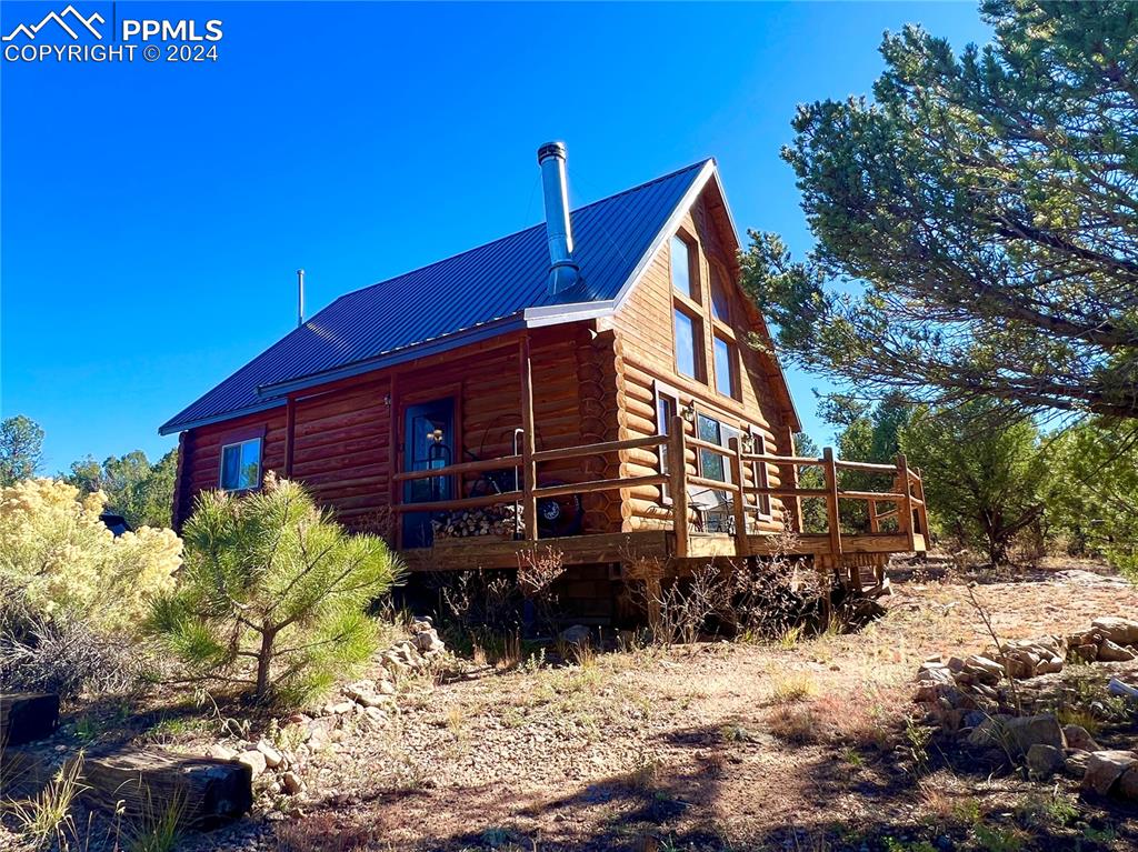 280 Kerrs Hill Road Westcliffe, CO 81252 - Photo 2 of 35 a view of a house with a yard