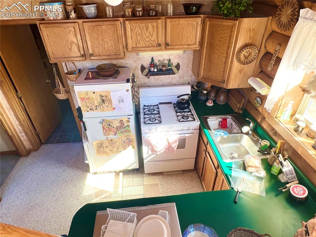 280 Kerrs Hill Road Westcliffe, CO 81252 - Photo 24 of 35 a view of living room with furniture and a wooden floor
