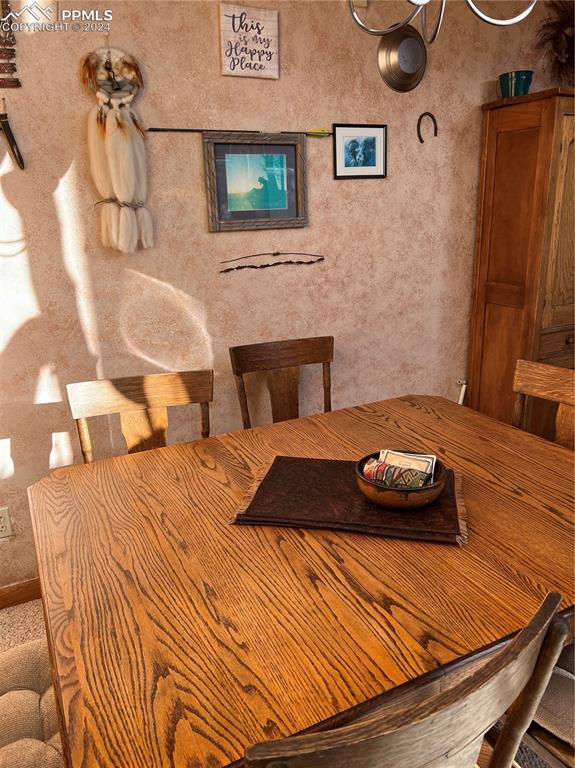 280 Kerrs Hill Road Westcliffe, CO 81252 - Photo 6 of 35 a bedroom with a bed and a couch