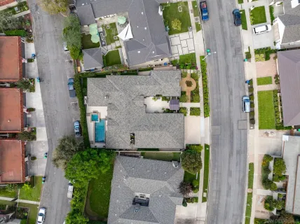 aerial view of multi story residential apartment building in front of building