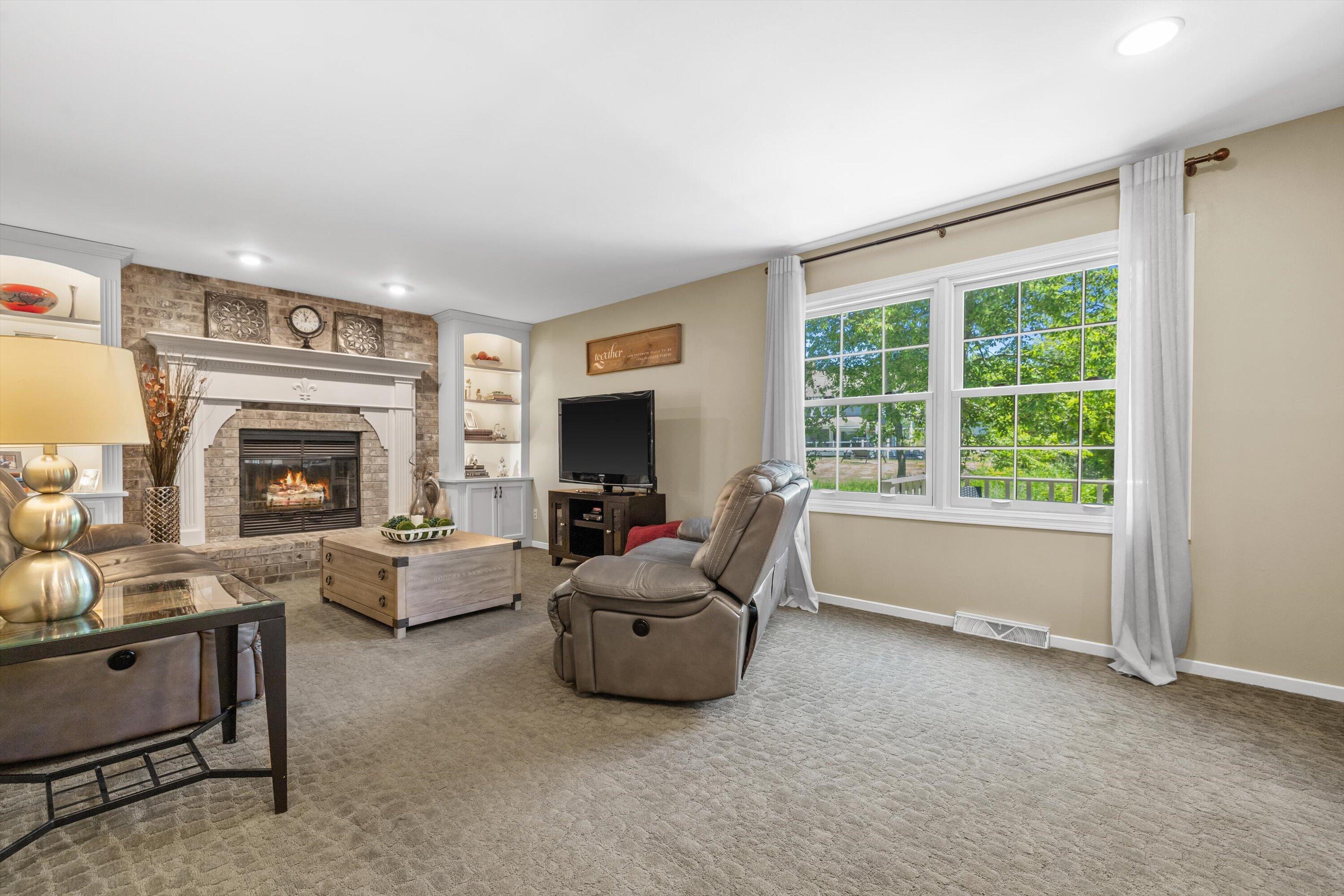 6501 Jessica Turn Caledonia, WI 53402 - Photo 22 of 66 Gas Fireplace Flanked W/Custom Cabinetry