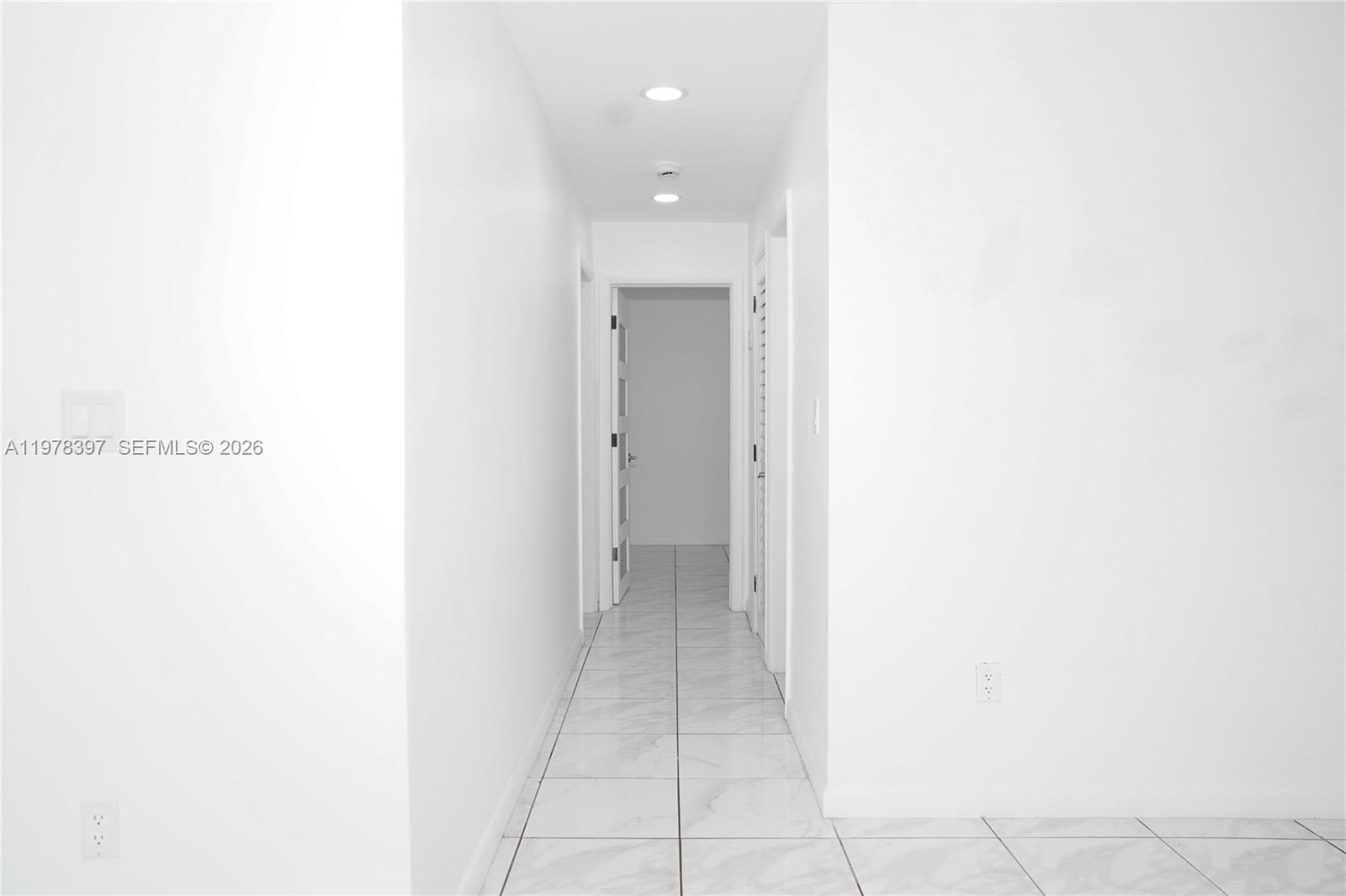3423 Southwest 3rd Street, Unit 1 Miami, FL 33135 - Photo 7 of 18 a view of a hallway