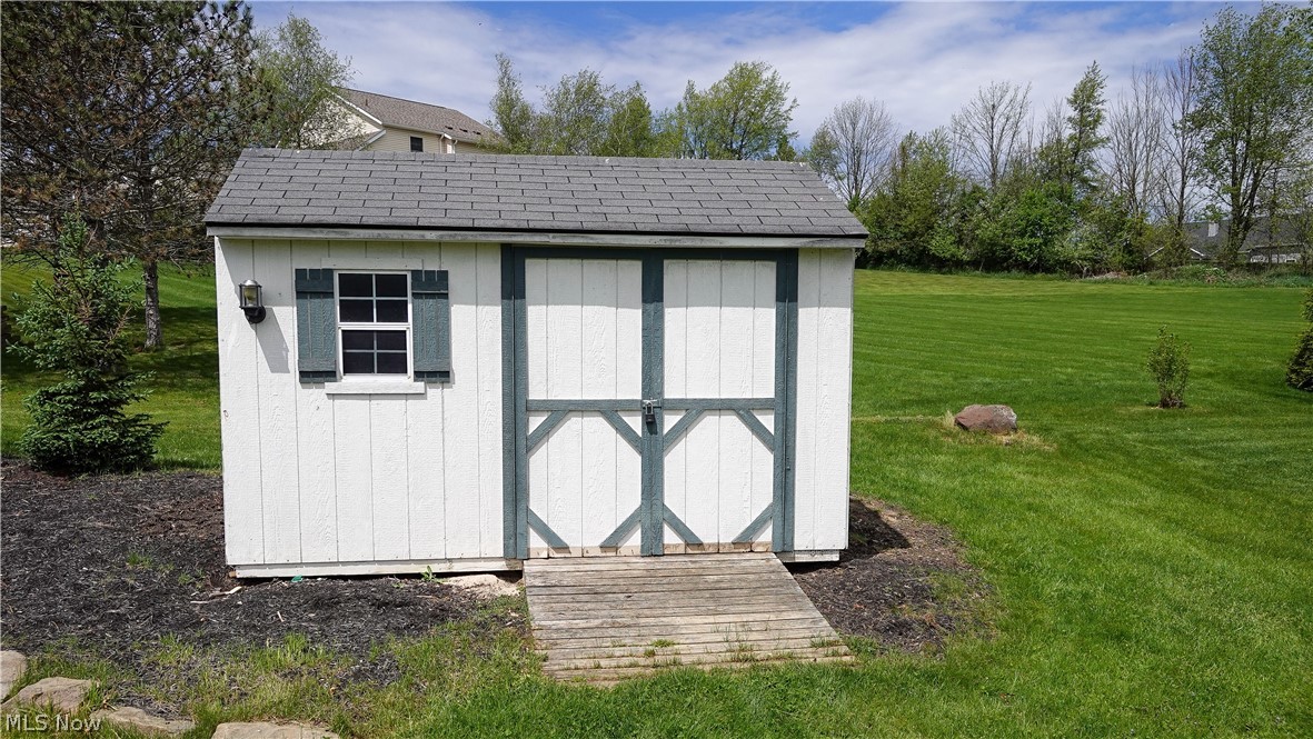 4849 Edson Road Kent, OH 44240 - Photo 47 of 50 View of shed / structure with a lawn