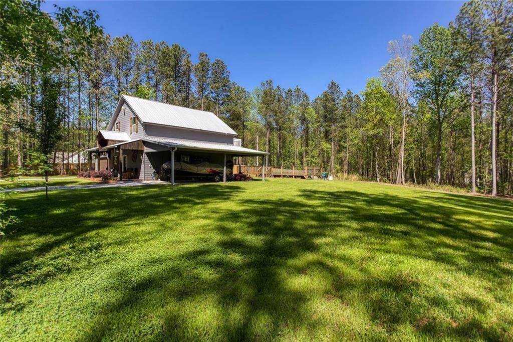 3445 Vinson Mountain Road Rockmart, GA 30153 - Photo 3 of 40 a view of a house with a big yard