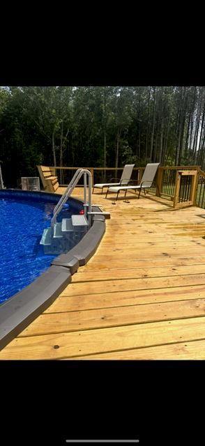 3445 Vinson Mountain Road Rockmart, GA 30153 - Photo 35 of 40 a view of swimming pool with lawn chairs