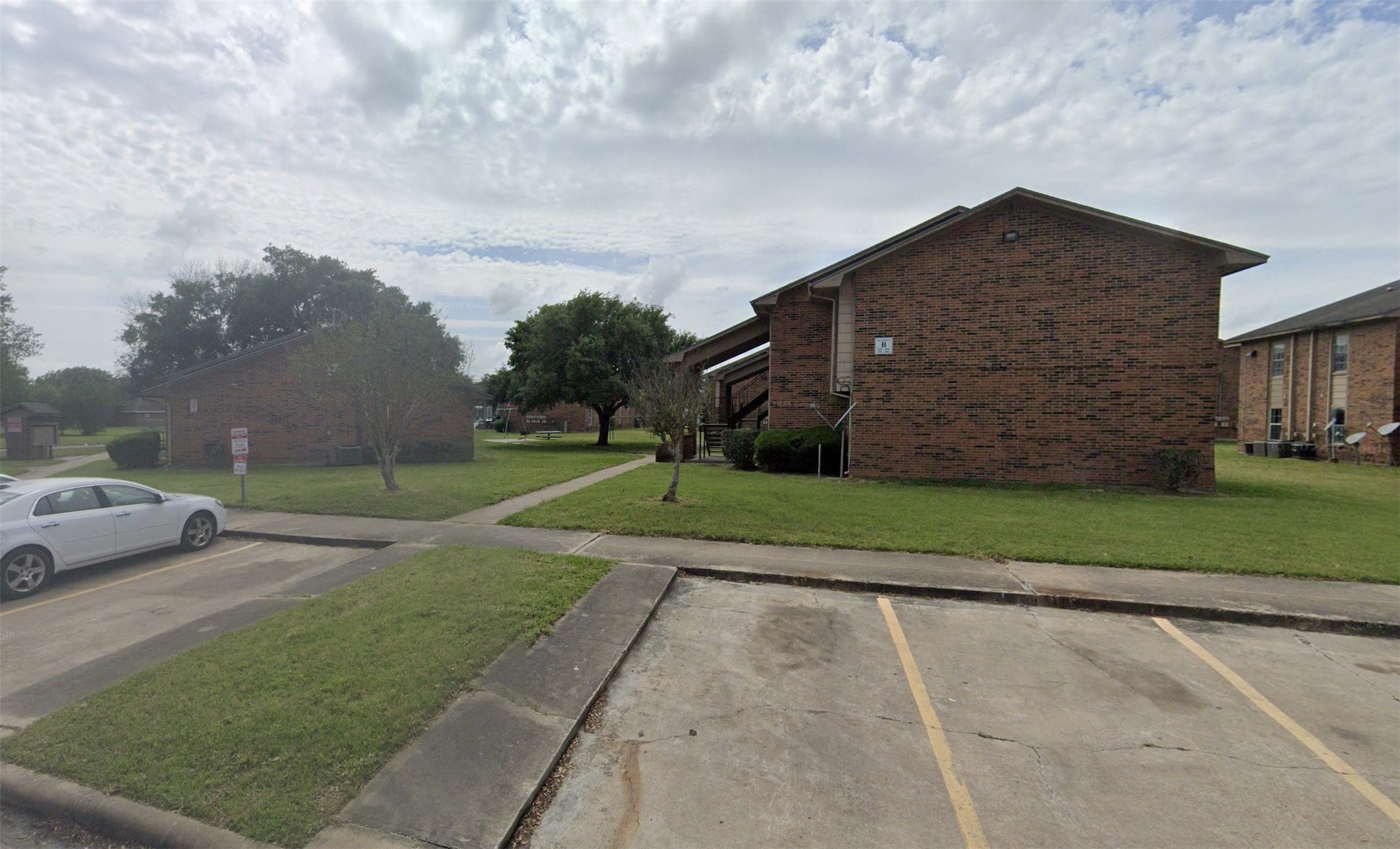 1845 5th Street Hempstead, TX 77445 - Photo 2 of 10 a house view with a garden