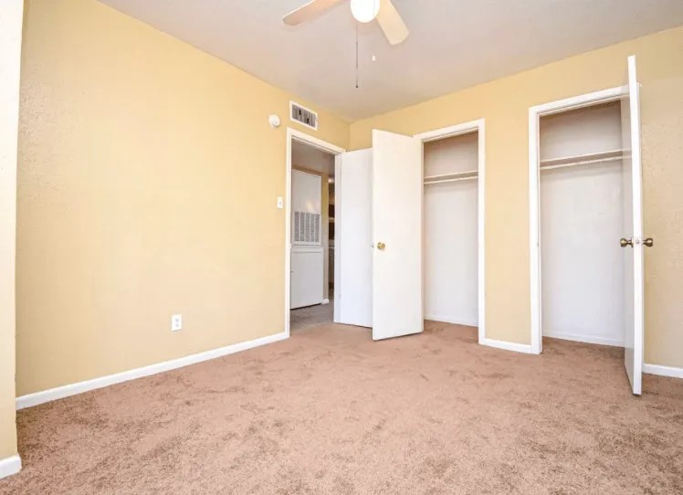 1845 5th Street Hempstead, TX 77445 - Photo 8 of 10 a view of an empty room with a chandelier fan
