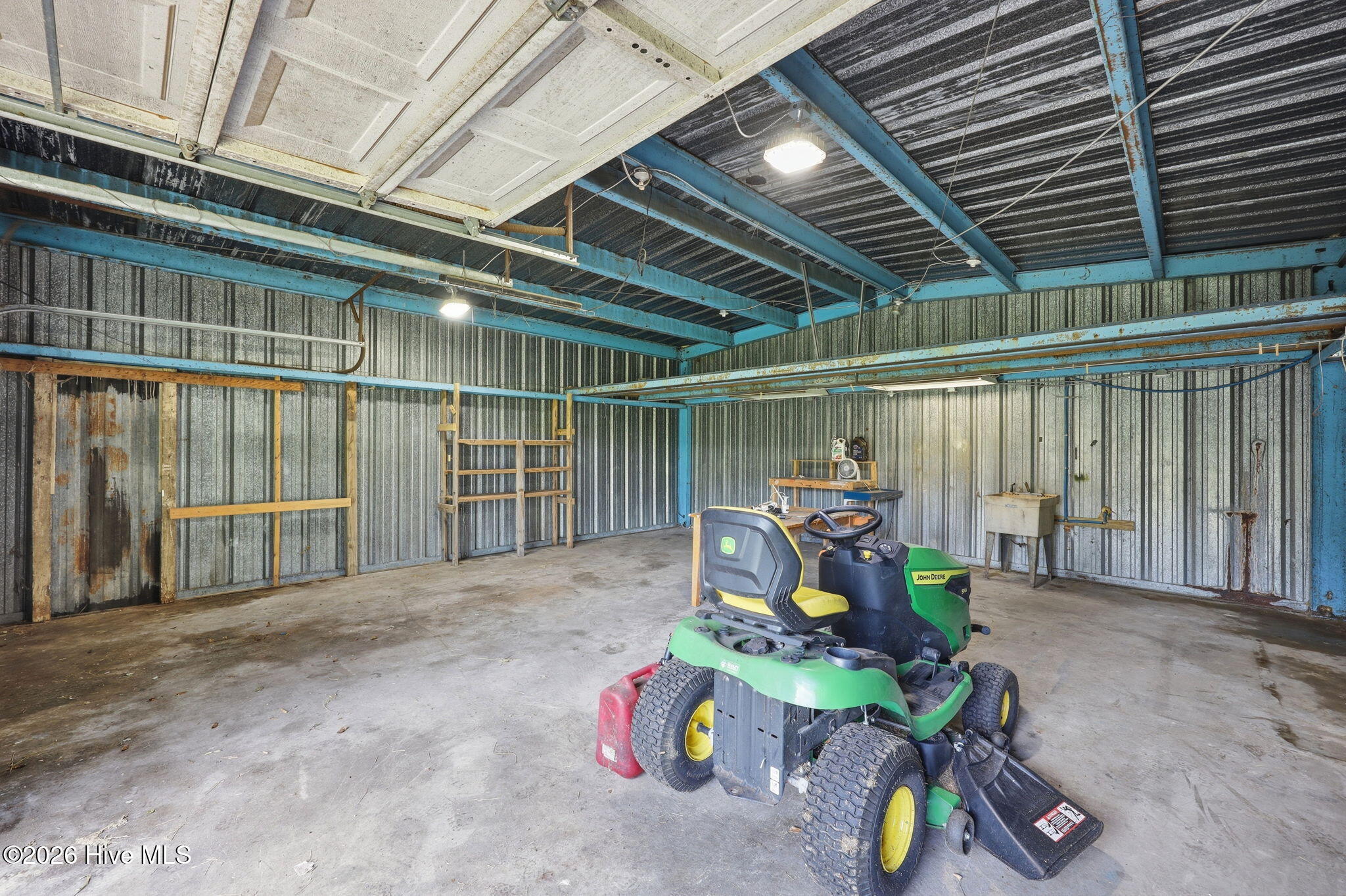 1040 Broad Creek Road New Bern, NC 28560 - Photo 31 of 47 Includes power, utility sink, and overhead storage