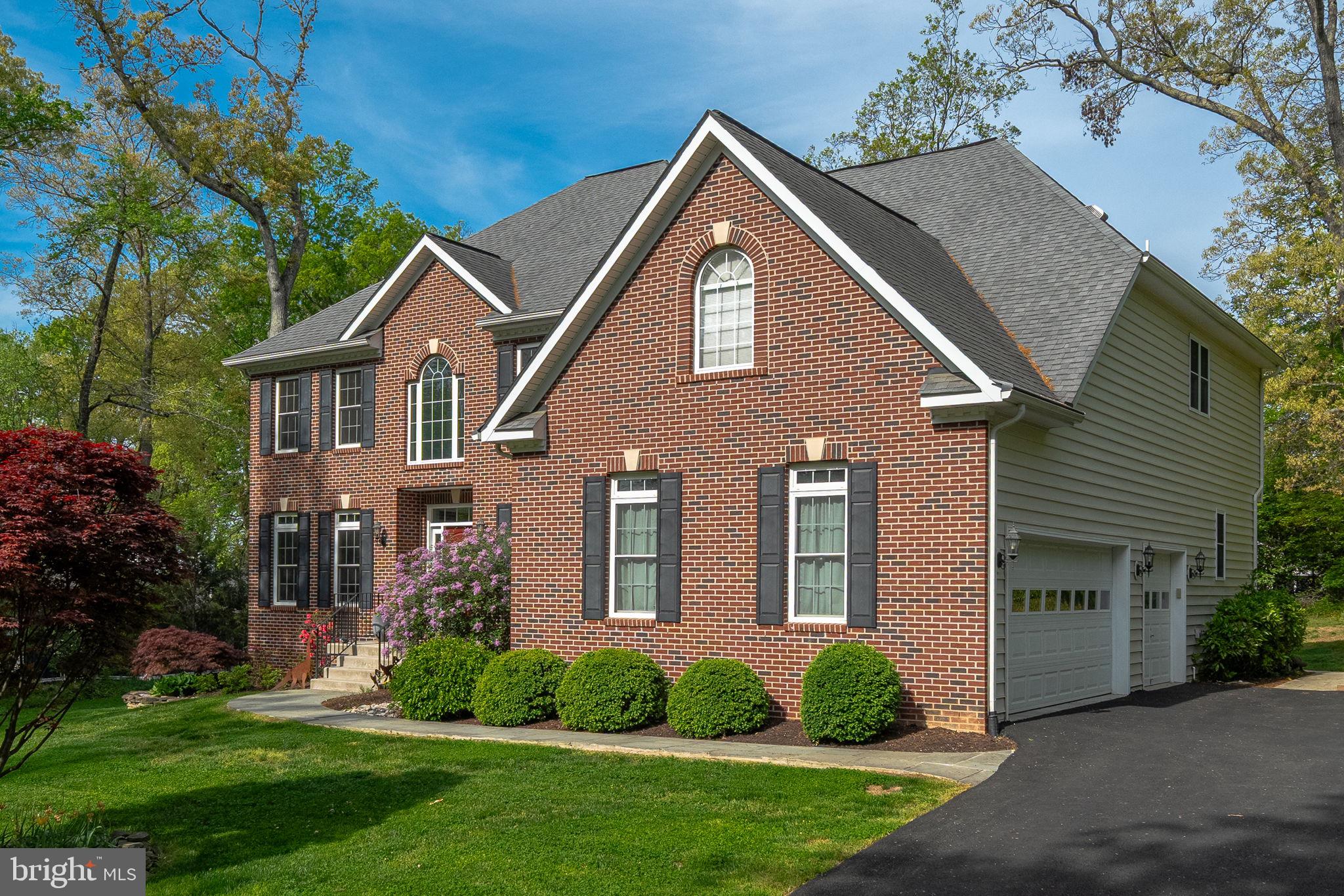 1232 Shenandoah Road Alexandria, VA 22308 - Photo 49 of 50 a front view of a house with a yard