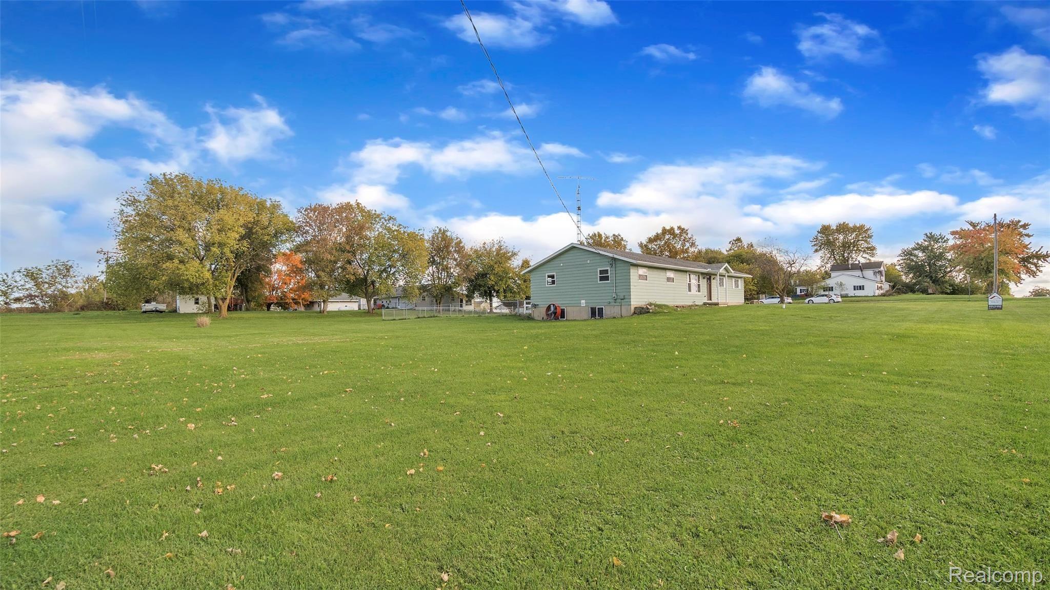 12012 Lennon Road Lennon, MI 48449 - Photo 29 of 34 12012-West-Lennon-Rd-windowstill-32.jpg
