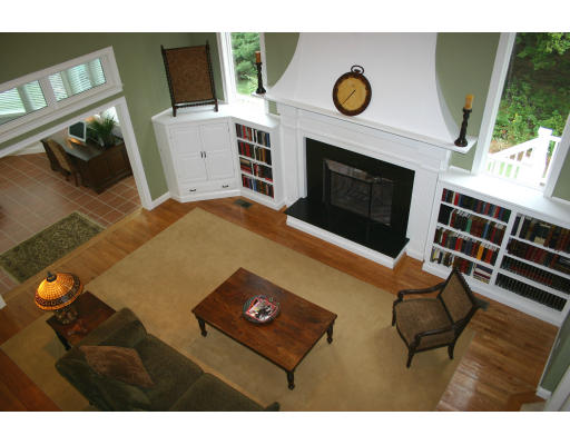 28 Moore Road Sudbury, MA 01776 - Photo 11 of 21 a view of livingroom with furniture and a fireplace
