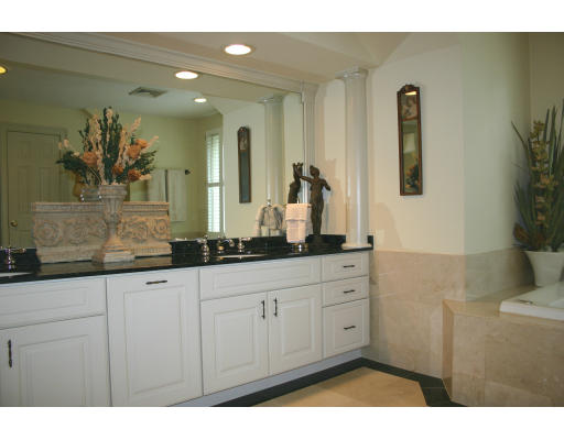 28 Moore Road Sudbury, MA 01776 - Photo 16 of 21 a bathroom with a sink and a mirror