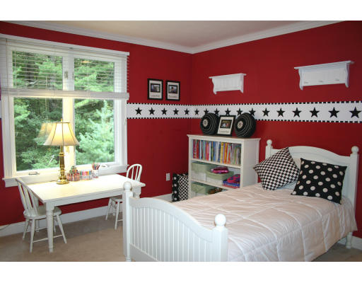 28 Moore Road Sudbury, MA 01776 - Photo 17 of 21 a bedroom with a bed table and a window